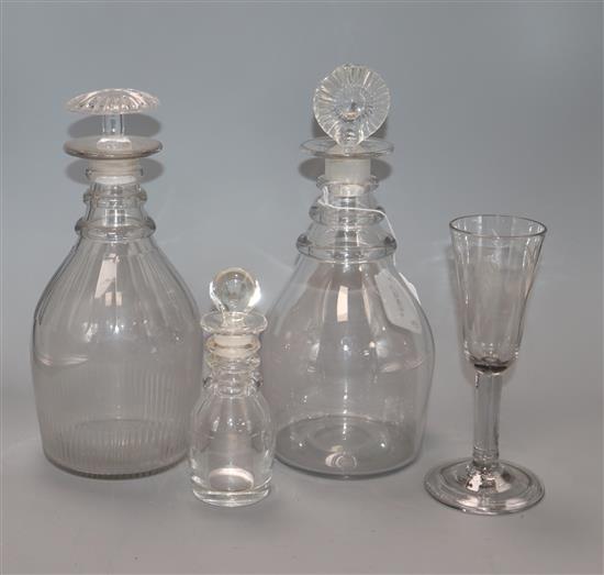 An early 19th century ale glass, two ring neck decanters and an oil jar tallest 26cm